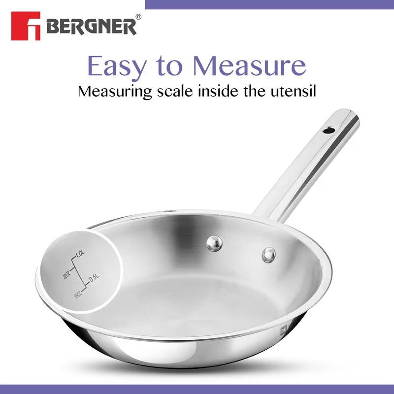 Silver frying pan showing its interior measuring scale