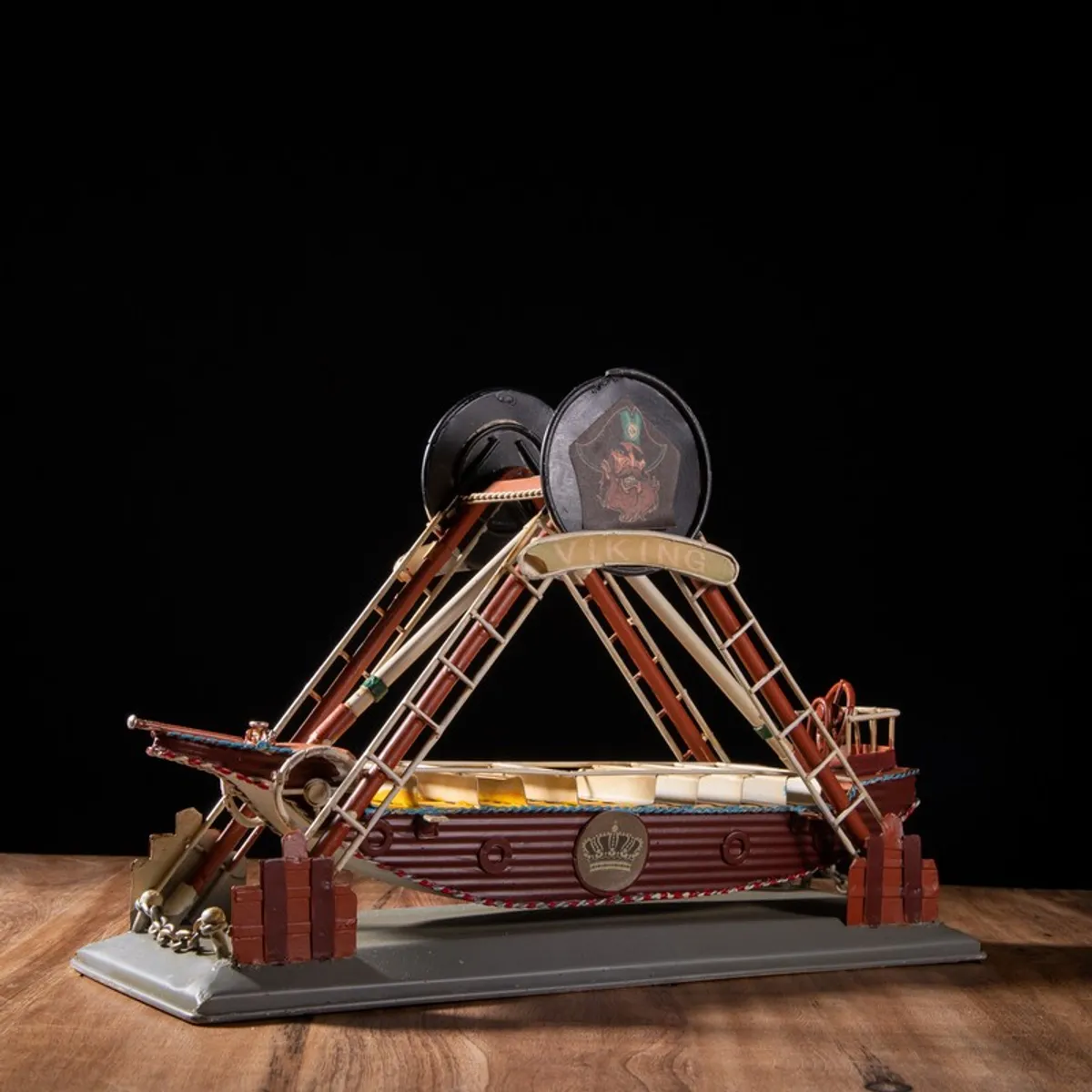 Front view of multicolour iron boat showpiece with nautical detailing