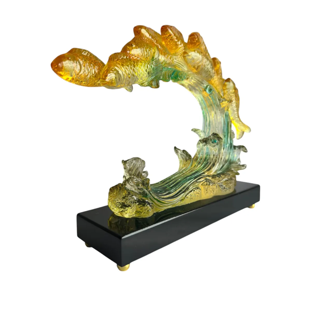 Angled view showing the koi wave sculpture and black rectangular base