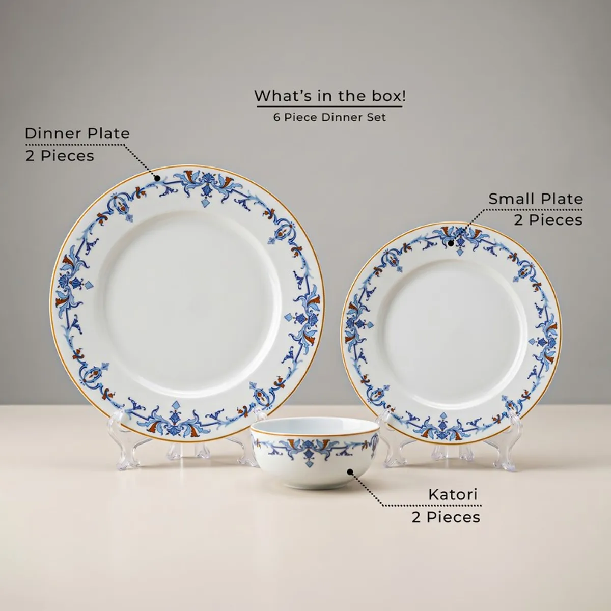 Blue and white dinner set with two plates and two bowls displayed together