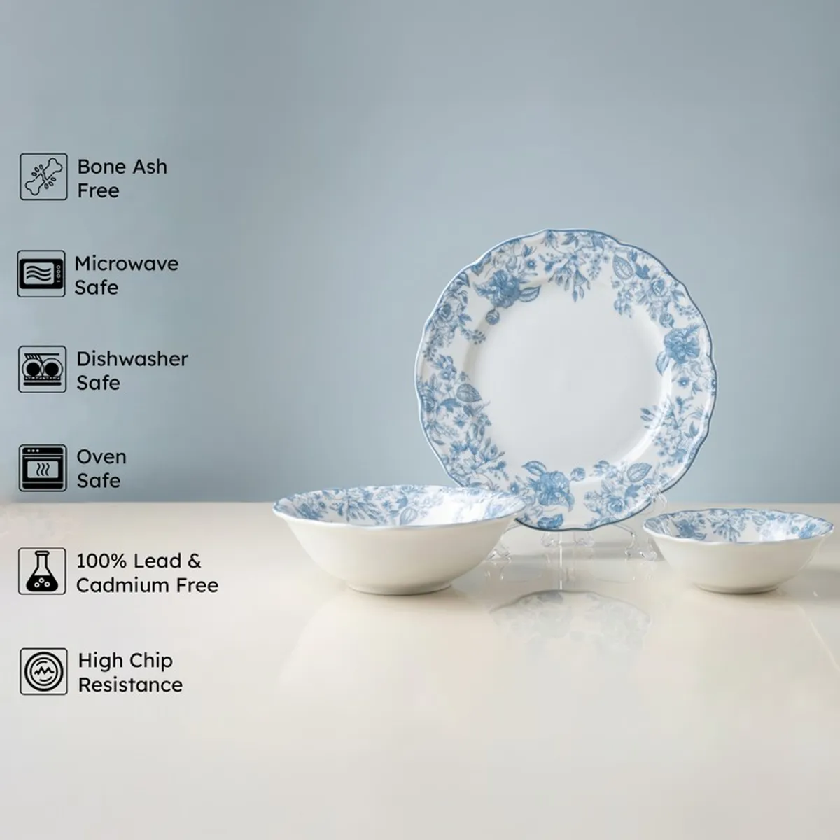 Blue and white floral plate and bowls on a tabletop