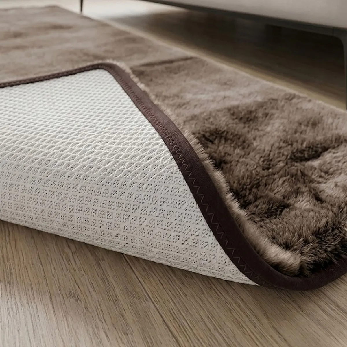 Close-up of the rug underside showing its anti-skid backing