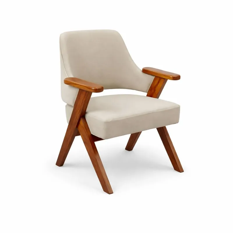 Angled view of a beige velvet accent chair with wooden arms