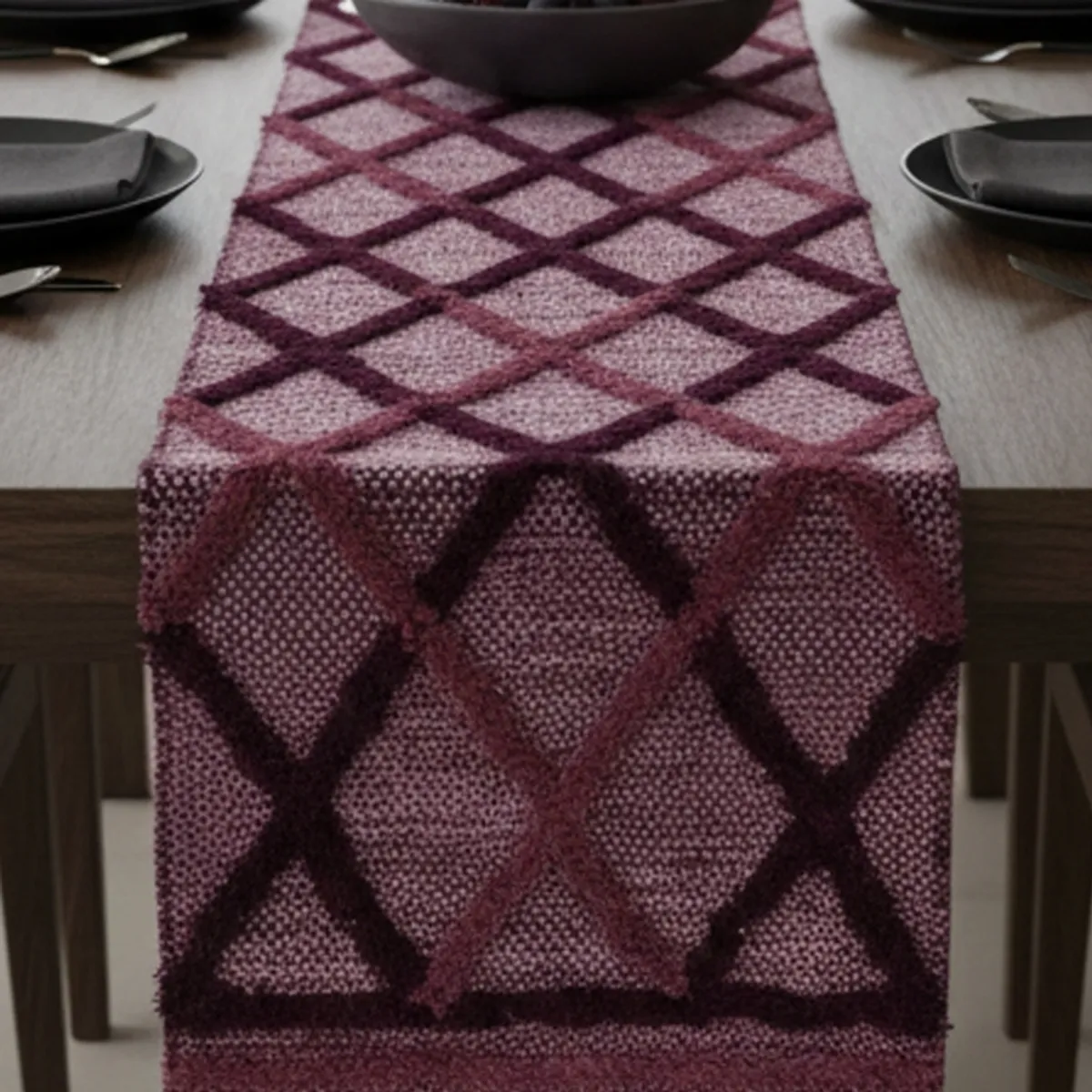 Close-up of the purple runner's raised geometric self-design and textured surface