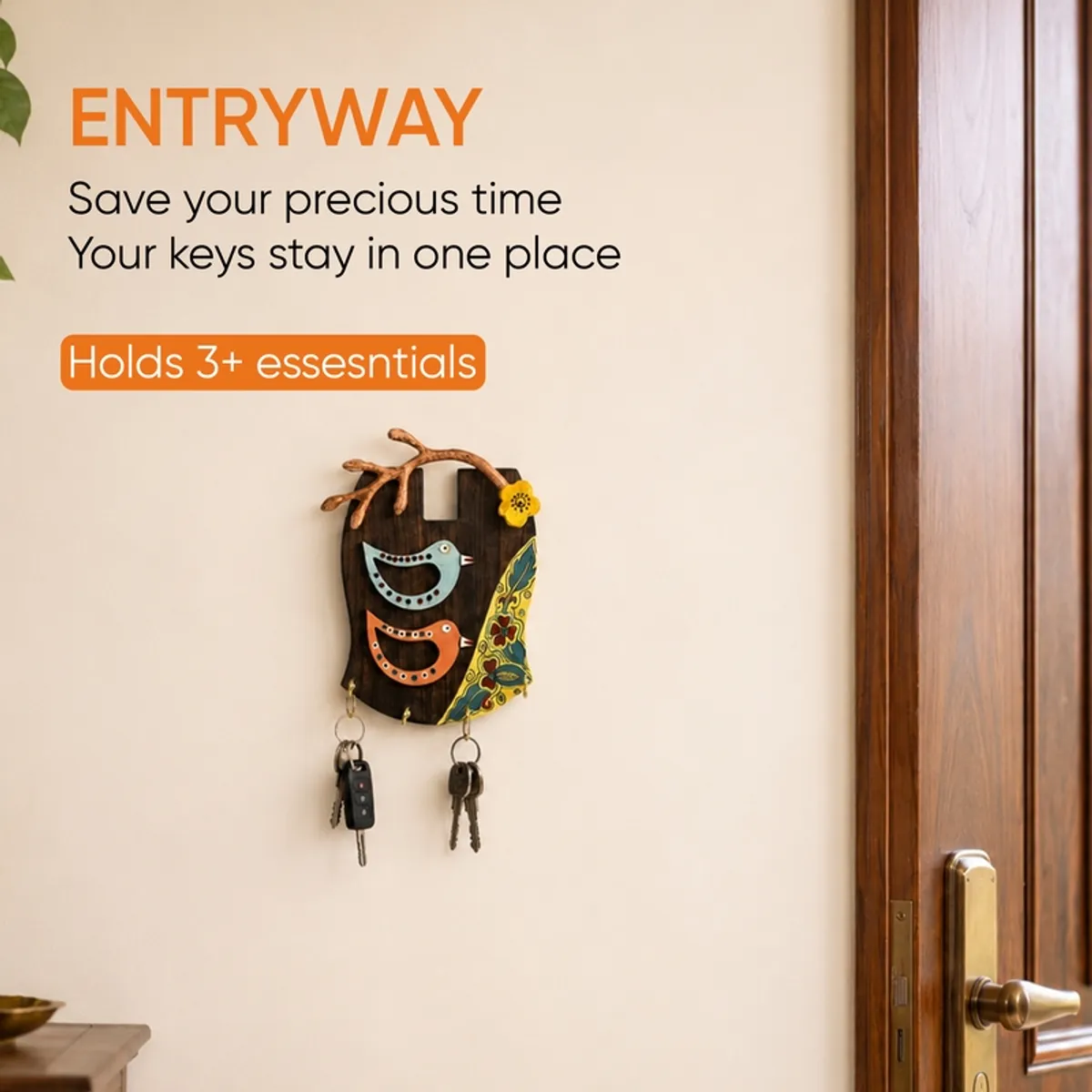 Wooden bird key holder displayed on an entryway wall