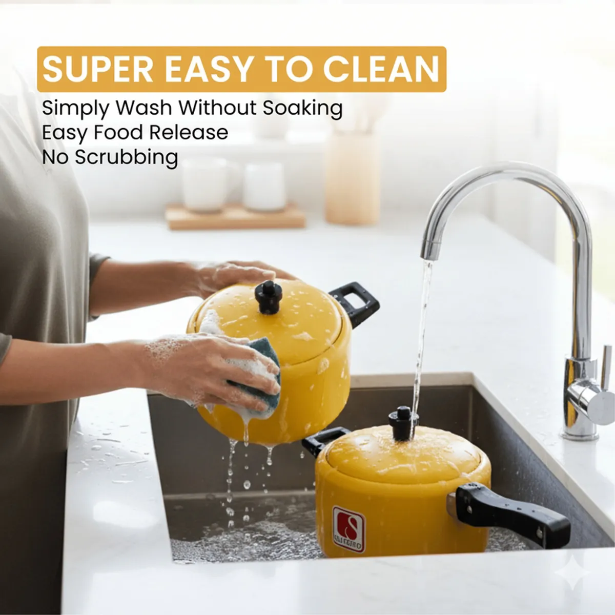 Yellow cookware pieces being washed under running water in a sink