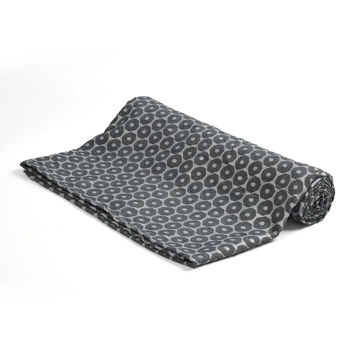 Rolled and folded blue and grey patterned throw