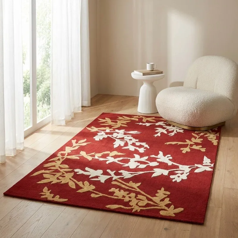Maroon botanical-pattern carpet placed in a bright room