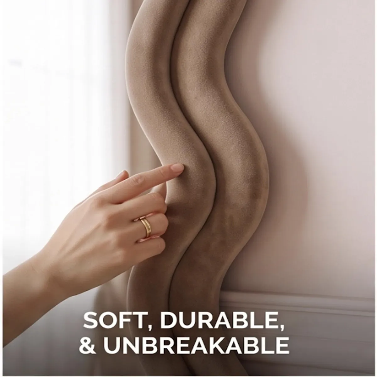 Close-up of the mirror's softly textured wavy brown frame
