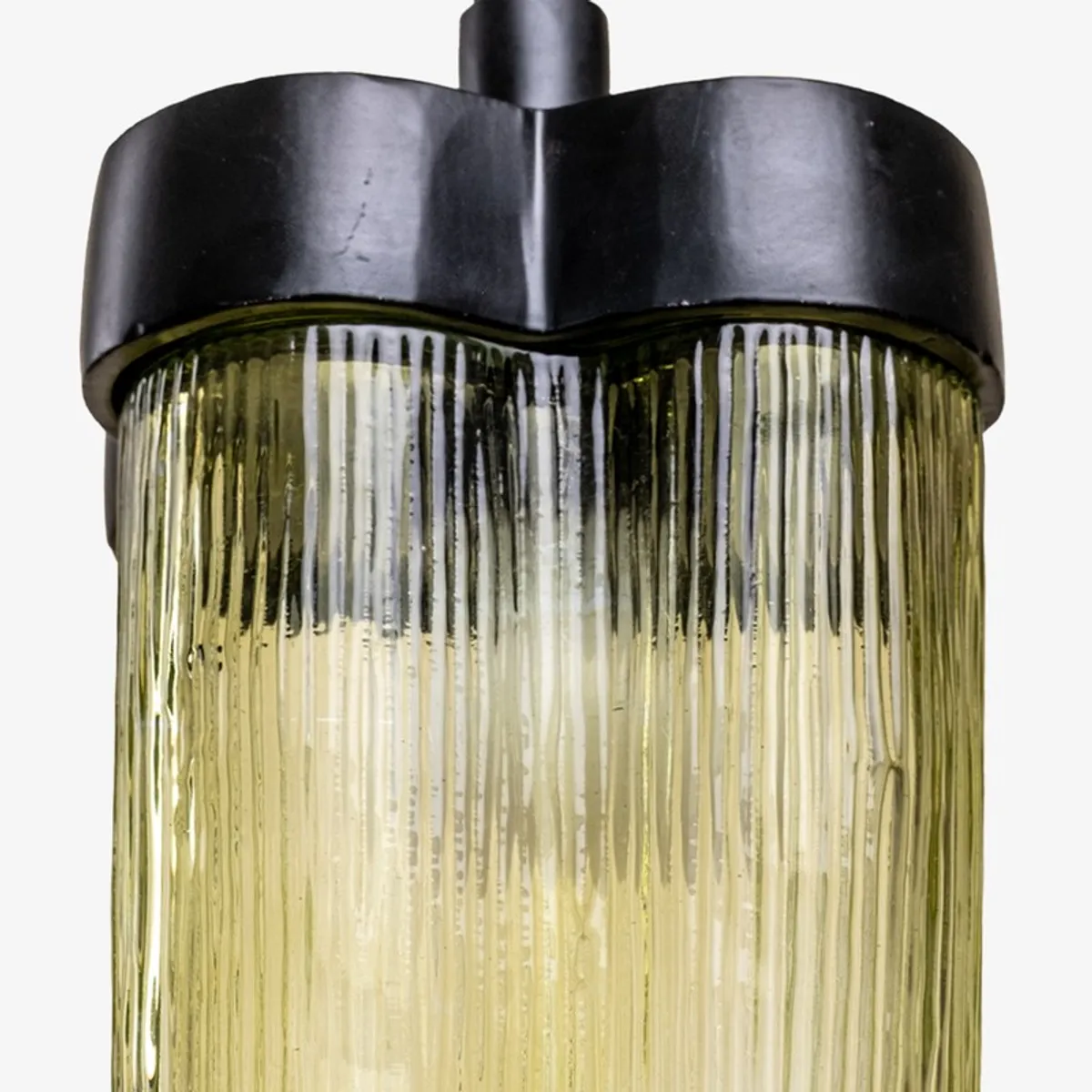 Front view of green ribbed glass ceiling lamp on plain background