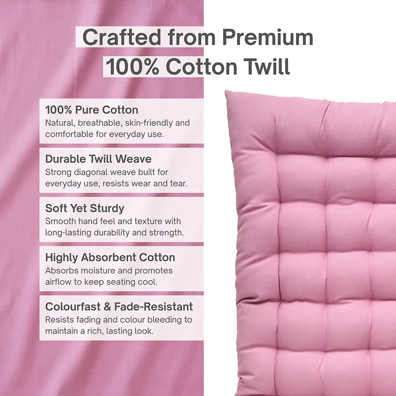Close view of a lilac purple tufted cushion with cotton fabric graphic