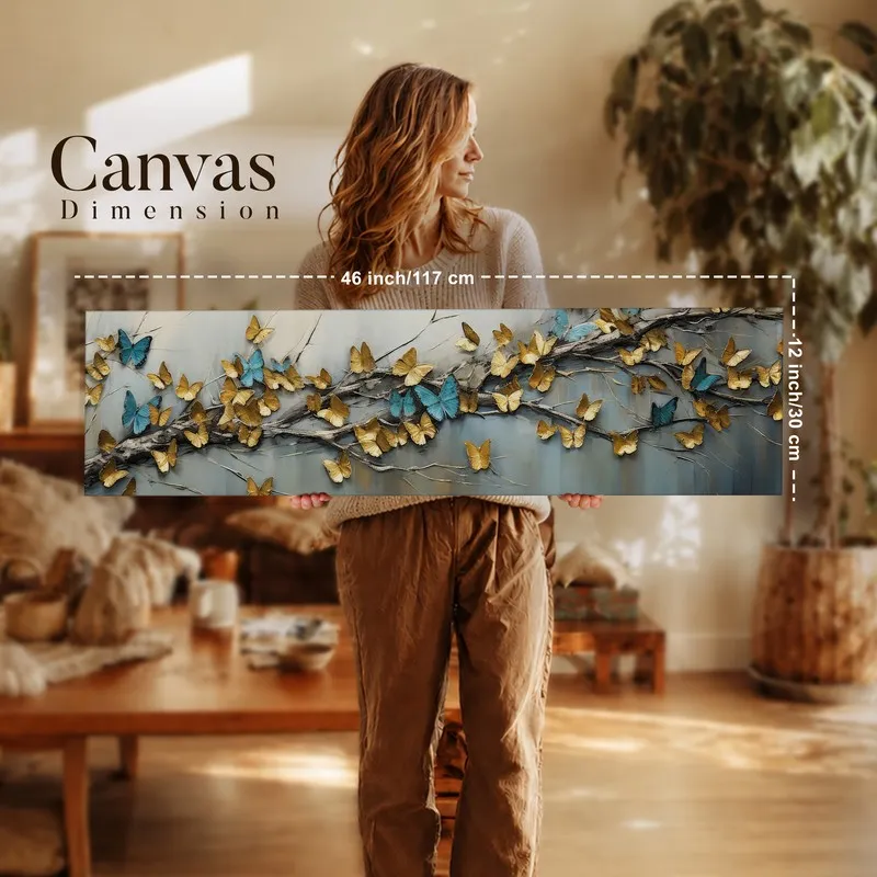 Woman holding a panoramic butterfly canvas wall art in a warm interior