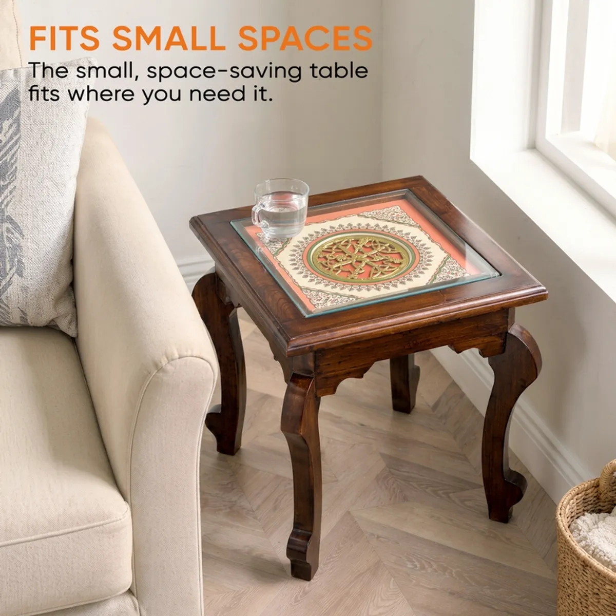 Compact brown side table placed beside a sofa near a window