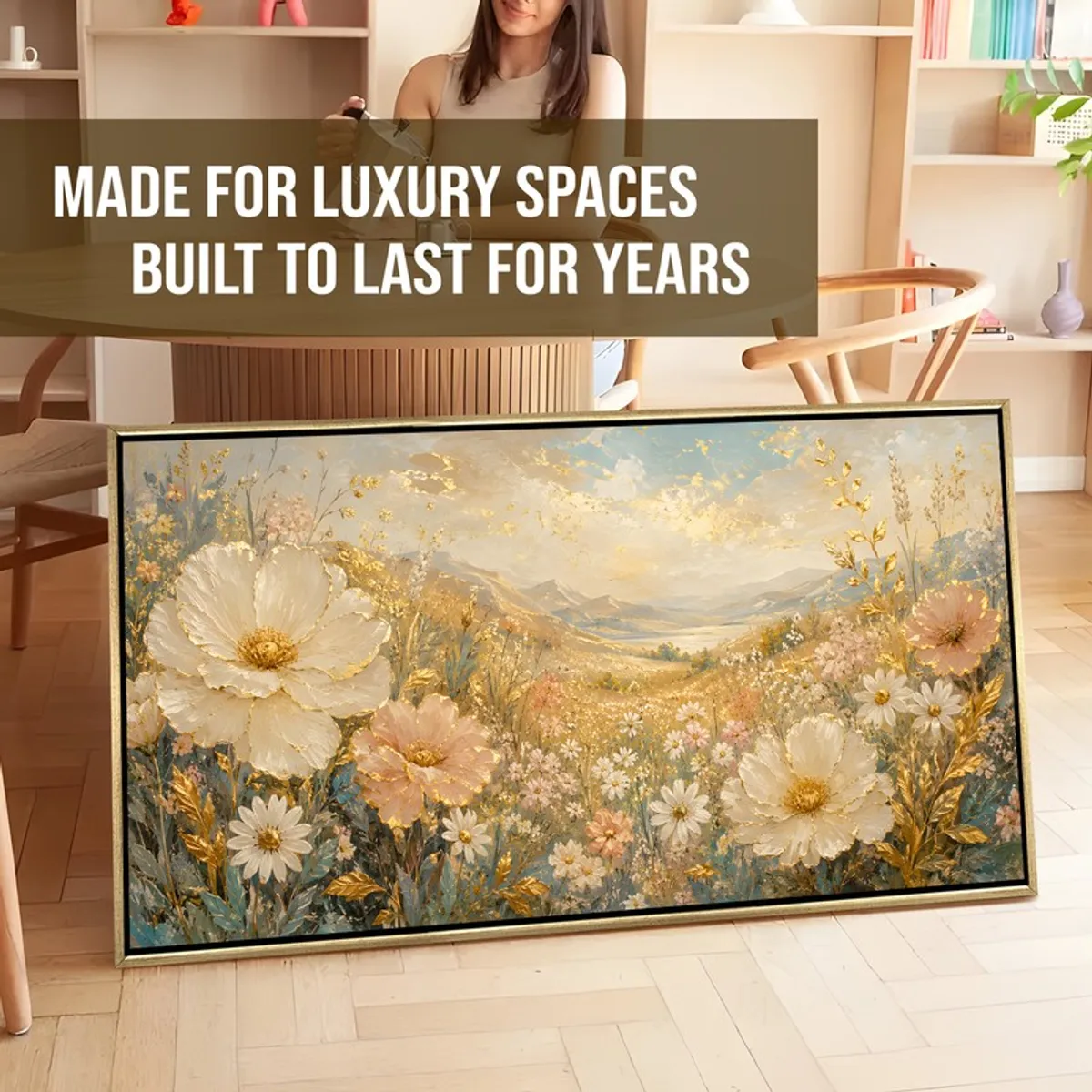 Large framed floral canvas painting leaning in a styled room