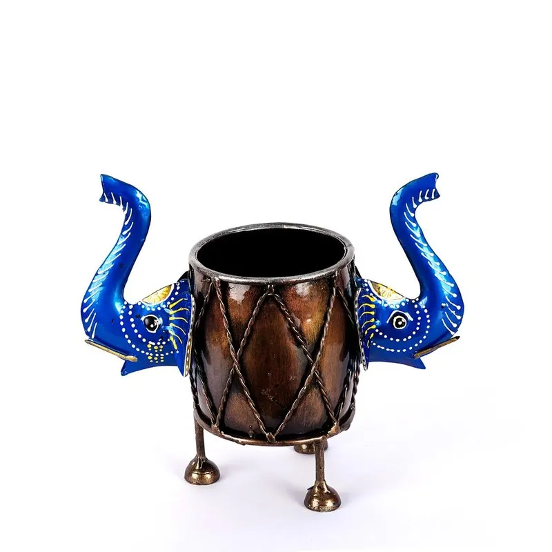 Front view of a metal pen stand with blue elephant motifs