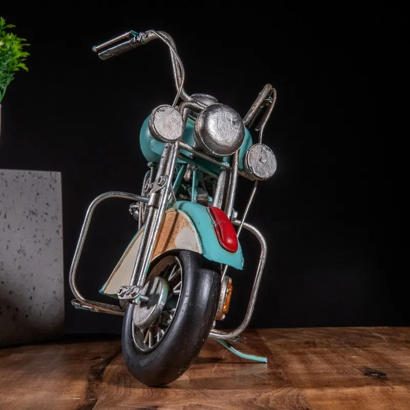 Front angled view of blue motorcycle showpiece with silver detailing