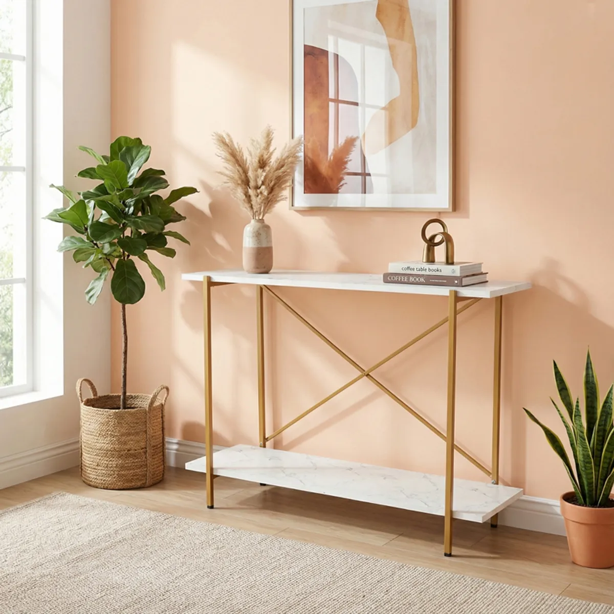White and gold console table styled with plants and framed wall art
