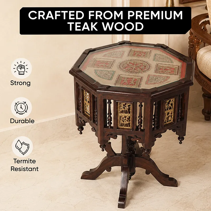 Teak wood side table with octagonal patterned top and carved pedestal base