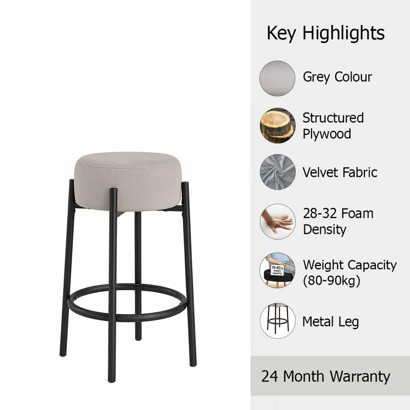 Grey bar stool with black metal legs on a white background