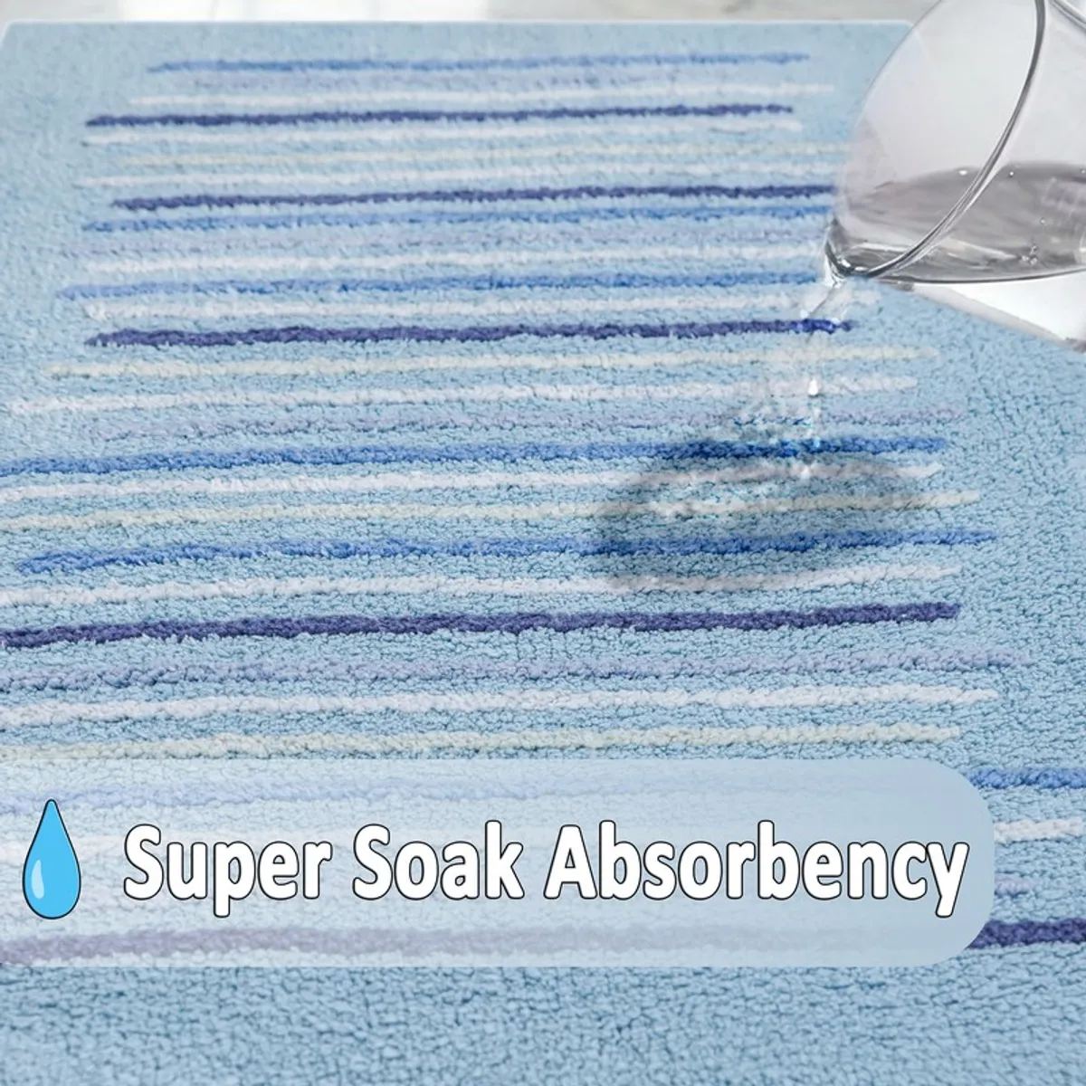 Close-up of water on the blue striped textured bath mat