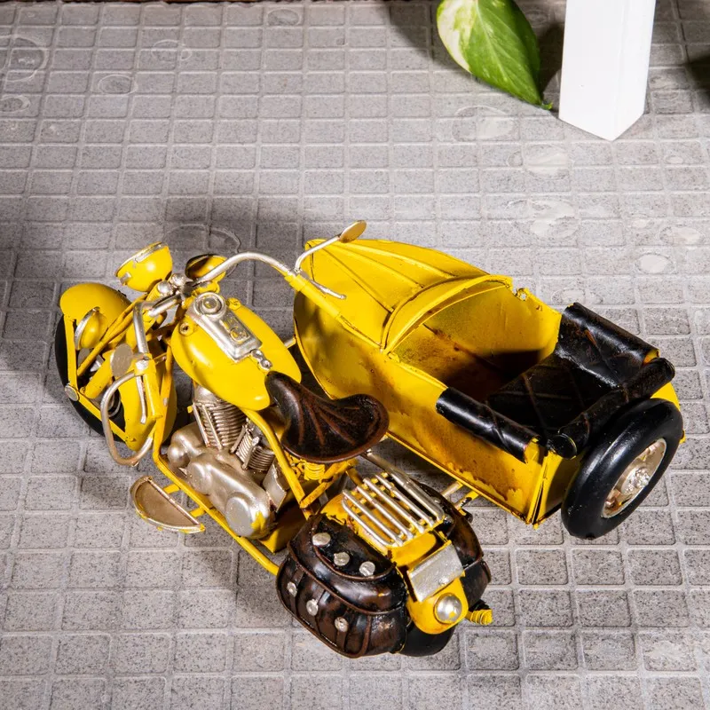 Top view of yellow sidecar motorcycle showpiece
