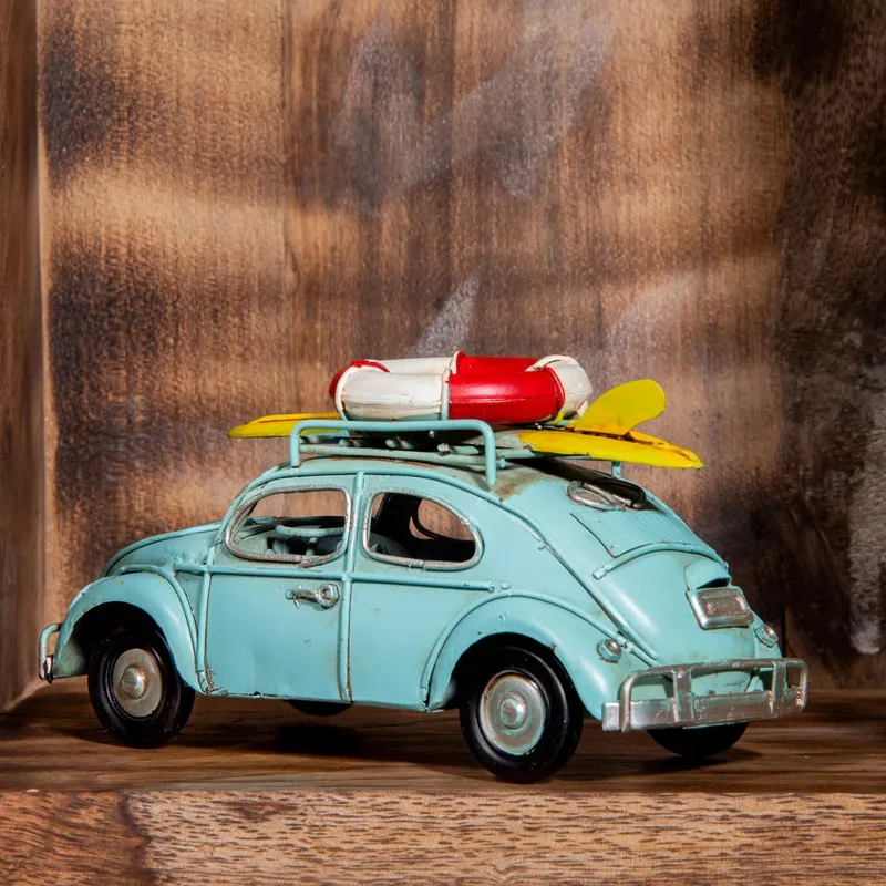 Rear side view of the blue retro beach car showpiece