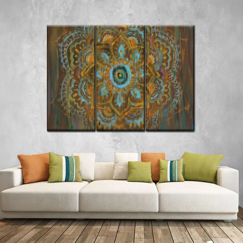 Triptych mandala wall art displayed above a sofa