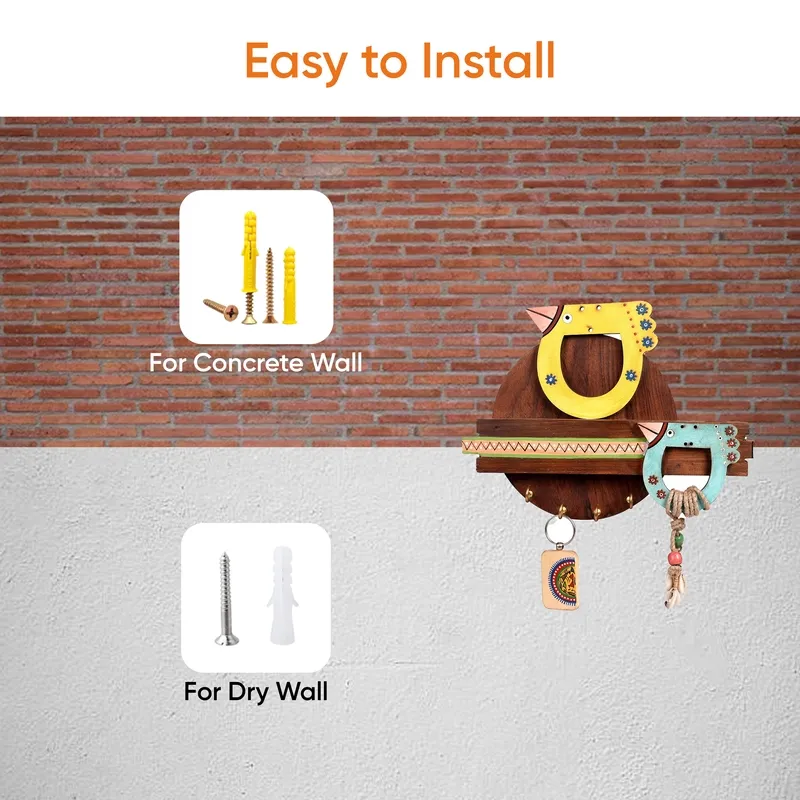 Wooden bird key holder shown mounted against a wall
