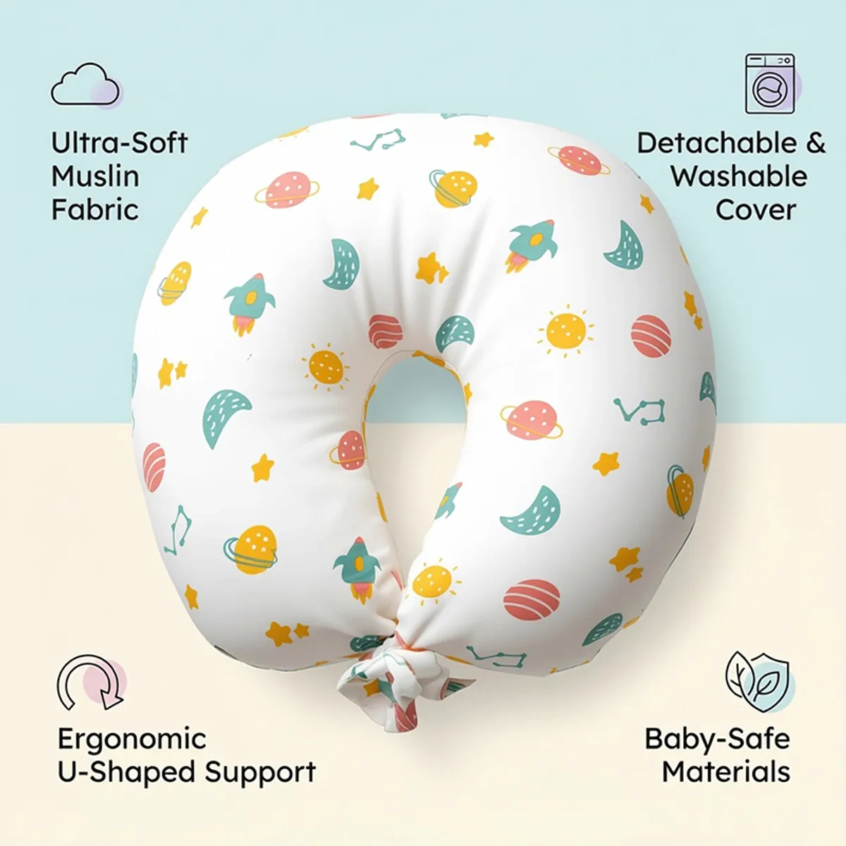 White U-shape feeding pillow with colourful space print on a plain background