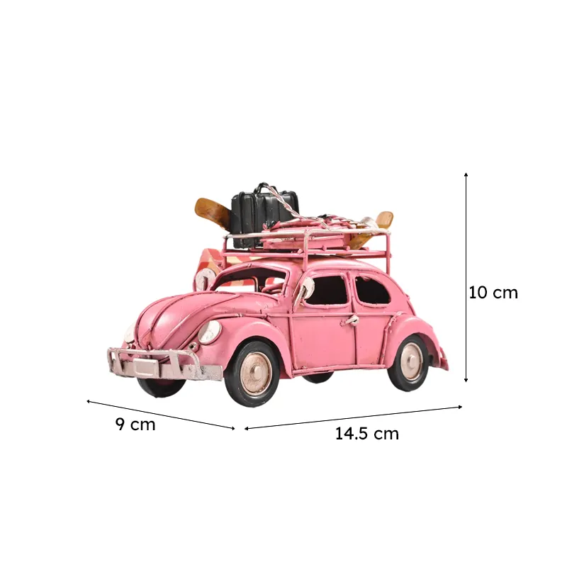 Pink vintage beetle car showpiece with dimensions shown beside it