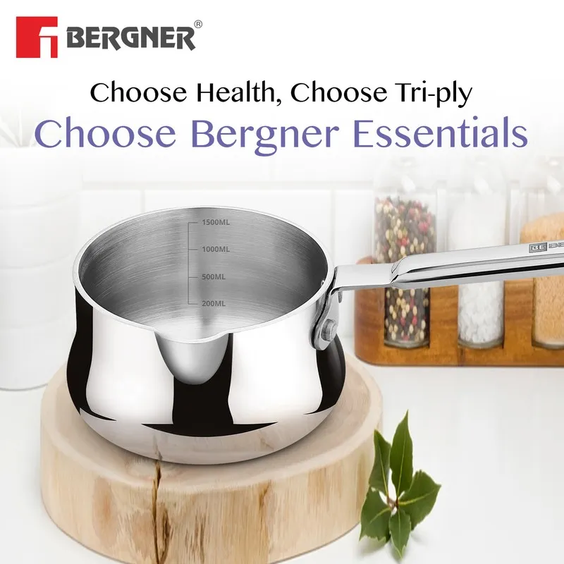 Silver saucepan styled in a bright kitchen setting