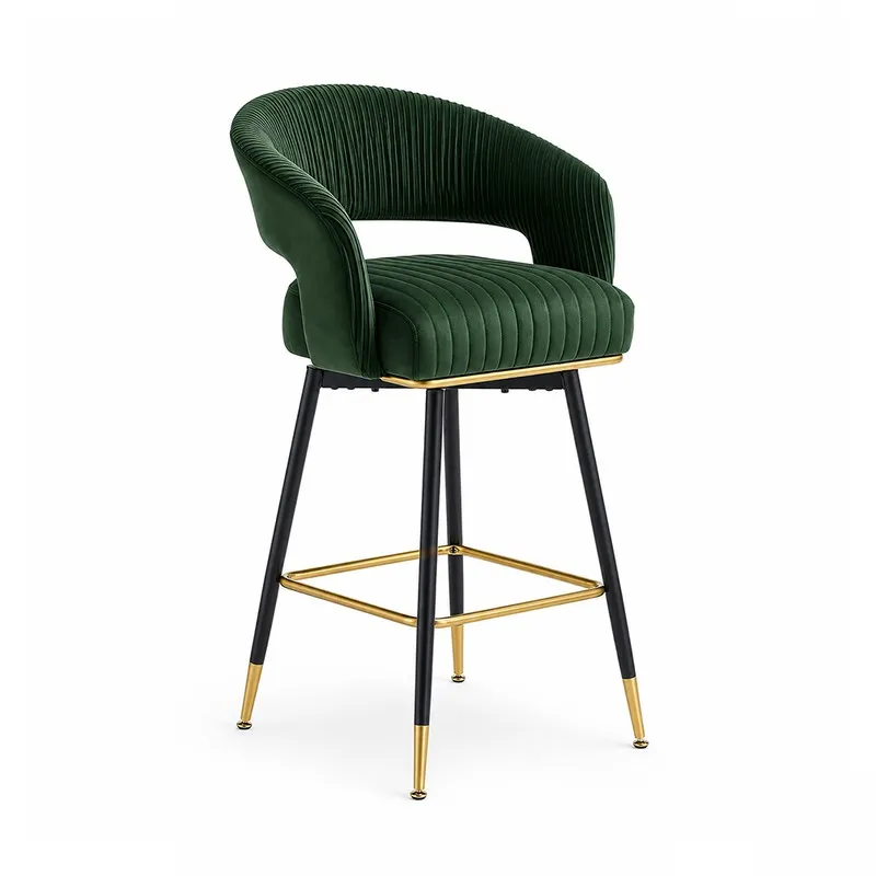 Front three-quarter view of a green ribbed velvet bar stool on a white background.