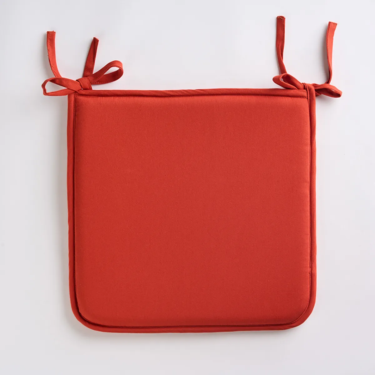 Terracotta-brown chair pad with four corner ties
