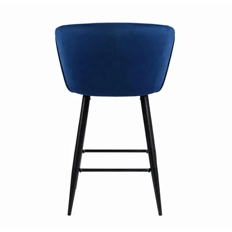 Rear view of blue velvet bar chair with black metal legs
