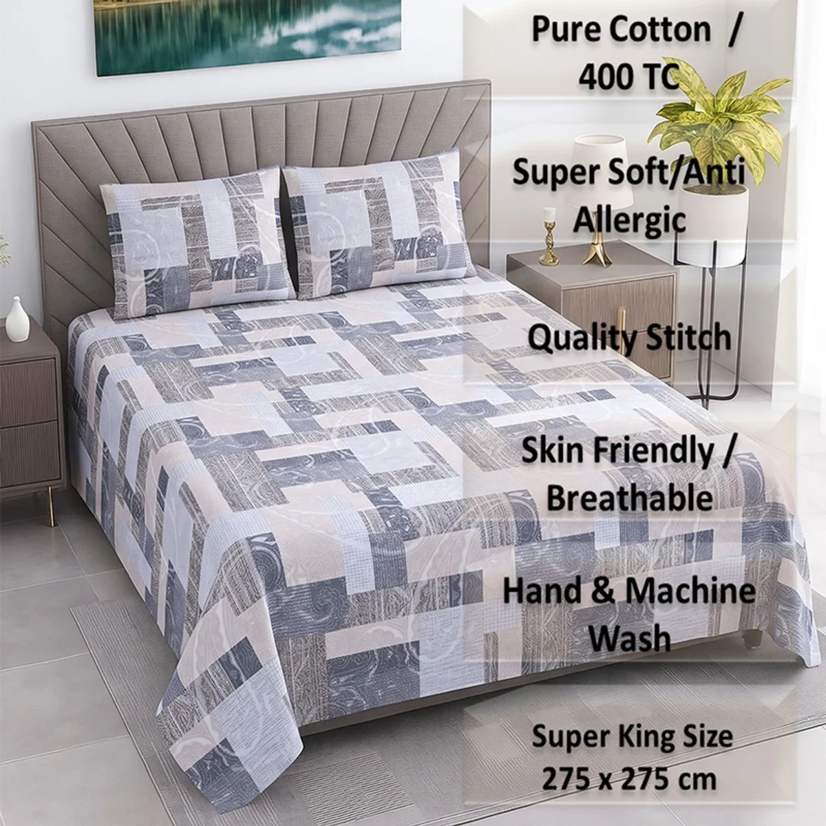 Styled bed with grey and beige printed bedsheet and matching pillow covers