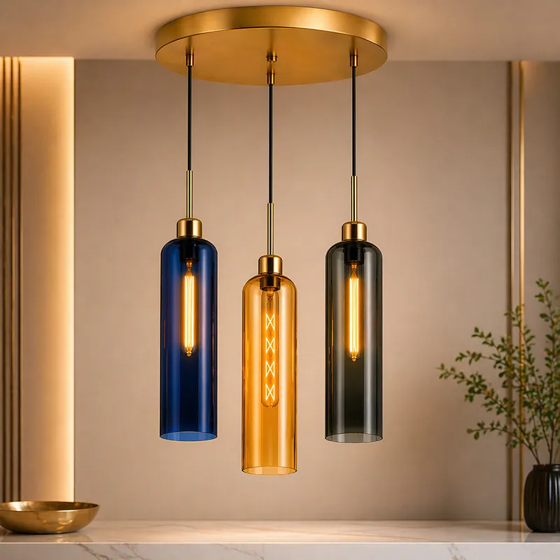 Close view of a trio ceiling lamp with blue, amber and smoky cylindrical glass shades