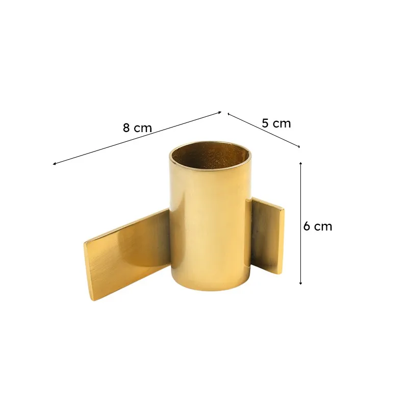 Gold geometric candle holder shown with dimension markings