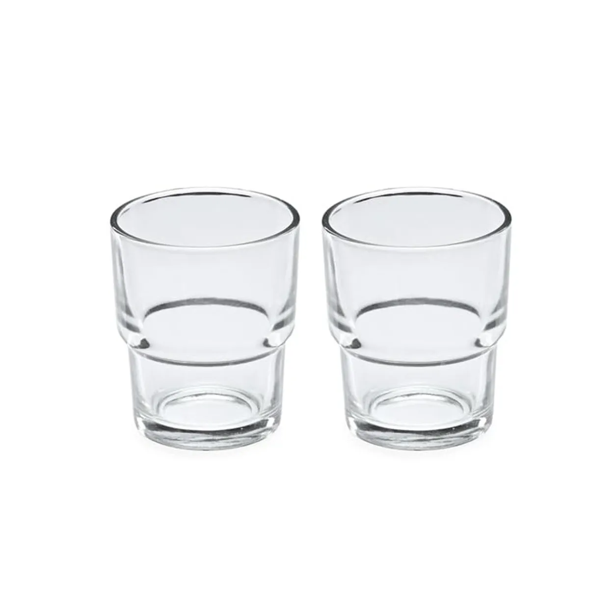 Pair of empty clear cylindrical glasses shown against a white background