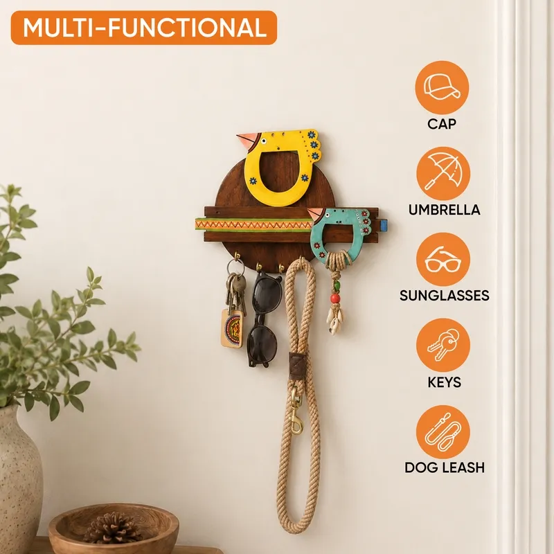 Bird-shaped wooden key holder shown holding everyday accessories