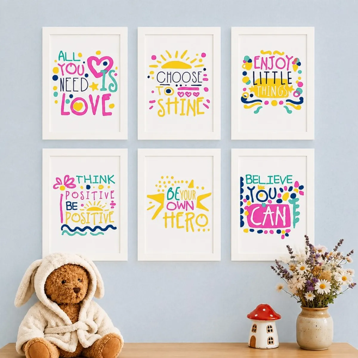 Set of six colourful framed quote prints displayed in two neat rows