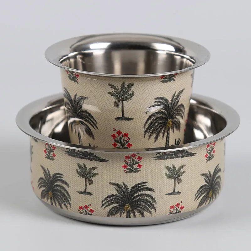 Close-up of an ivory Katori and Tumbler with palm tree and red flower detailing.