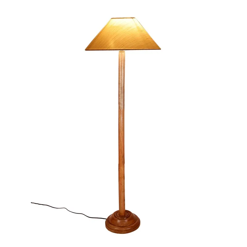 Isolated wooden floor lamp with a warm beige cone shade and black cord on a white background.