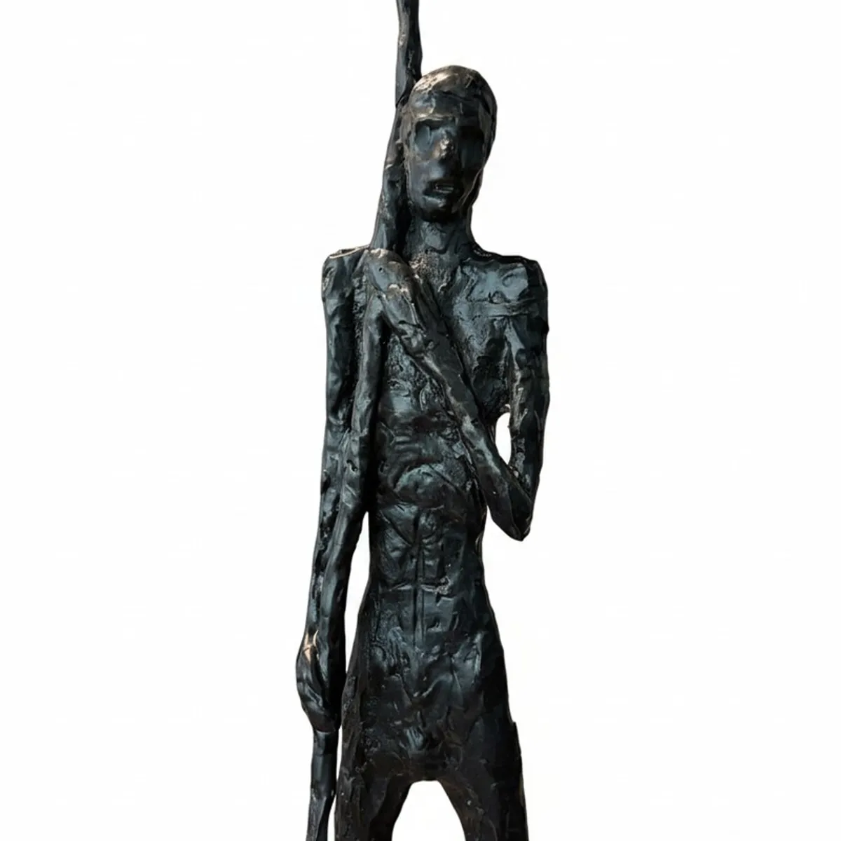Close-up of the textured black figurative sculpture