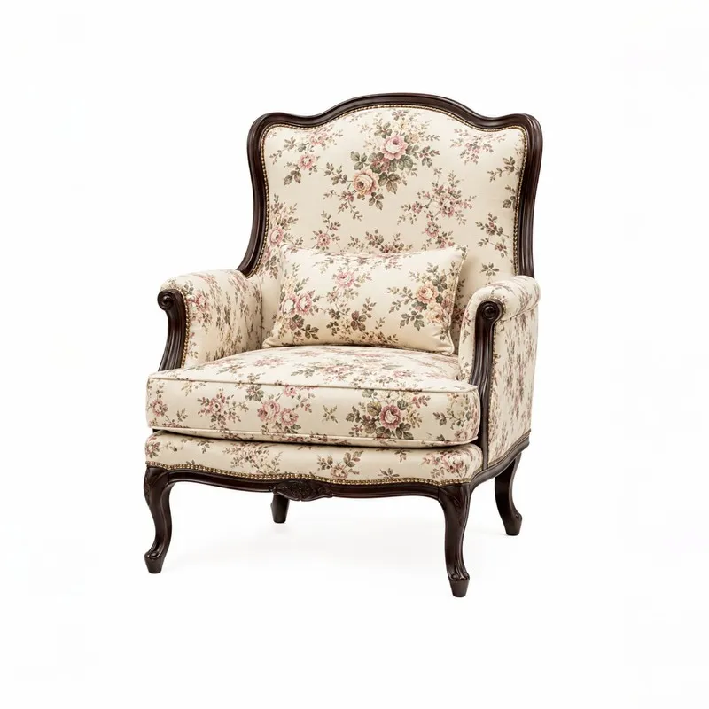 Angled view of accent chair with floral upholstery and dark wood frame