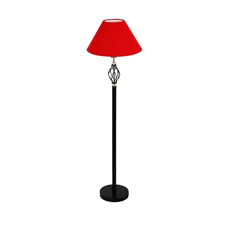 Full view of red shade floor lamp on a white background