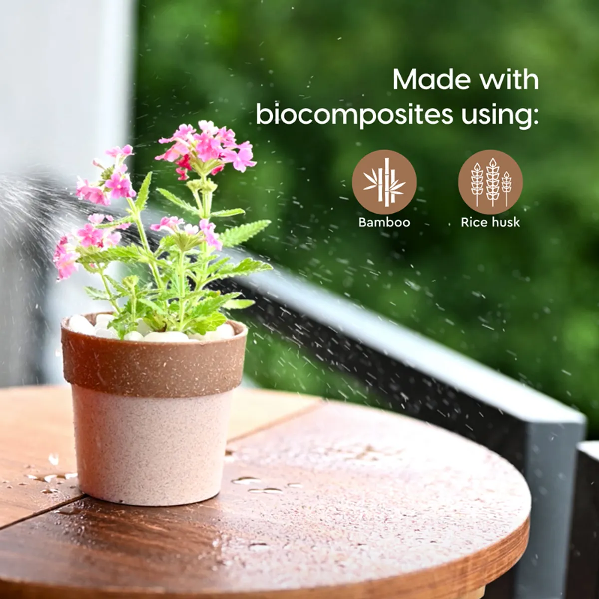 Single brown-rim speckled planter with a flowering plant on an outdoor table