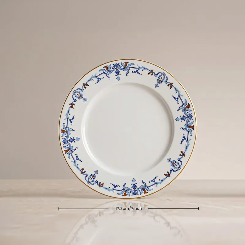 Single round quarter plate with blue ornamental rim and white centre