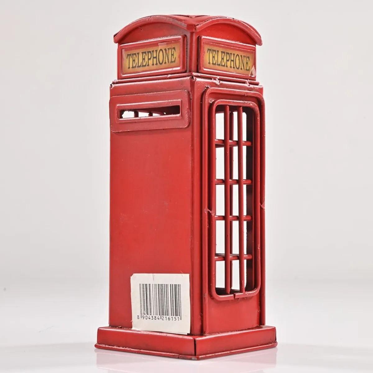 Rear angled view of red telephone booth metal showpiece