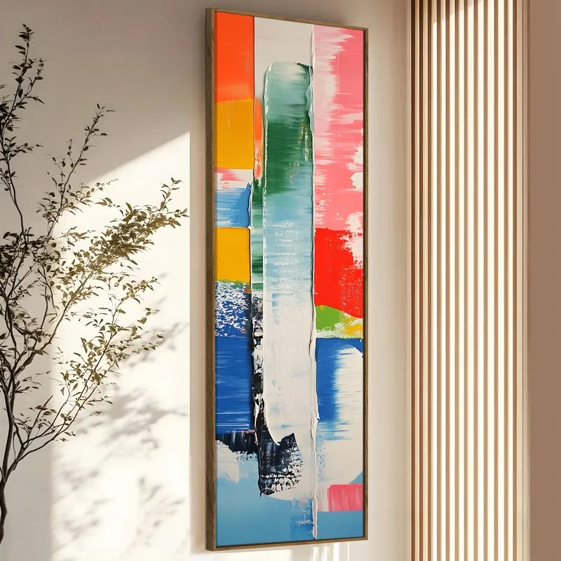 Vertical view of the framed abstract canvas showing layered multicolour brushstrokes.