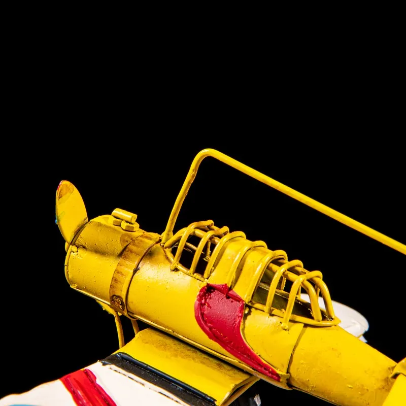 Close-up of the yellow airplane showpiece cockpit and body